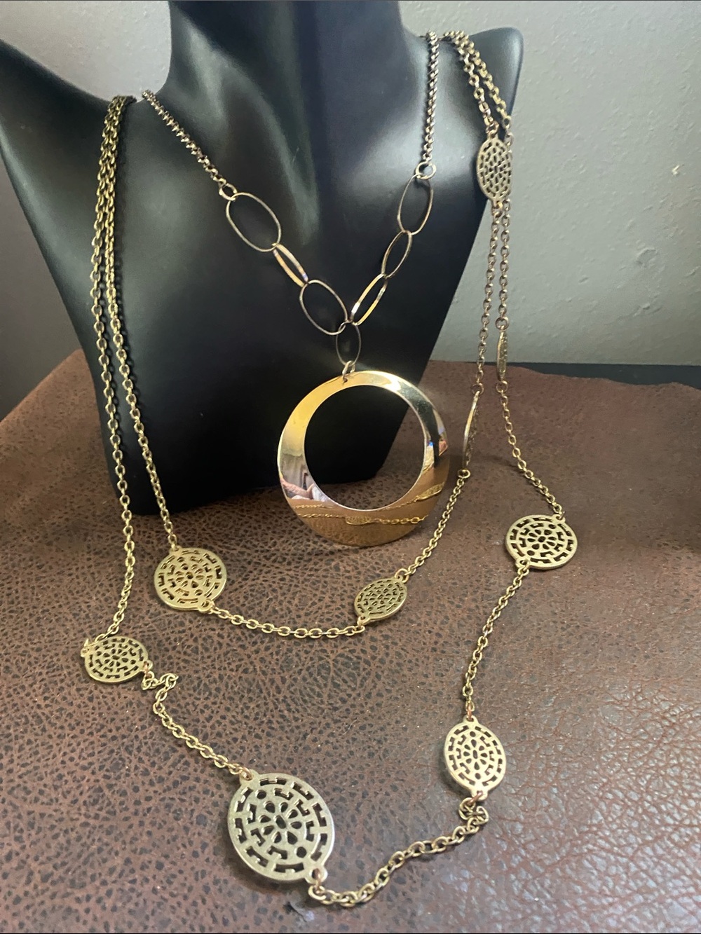 Rachel Zoe Long gold tone large circular cutout pendant & medallion necklaces
